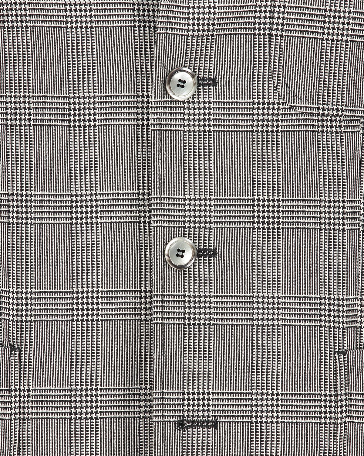 Close-up of a gray checkered fabric with buttons