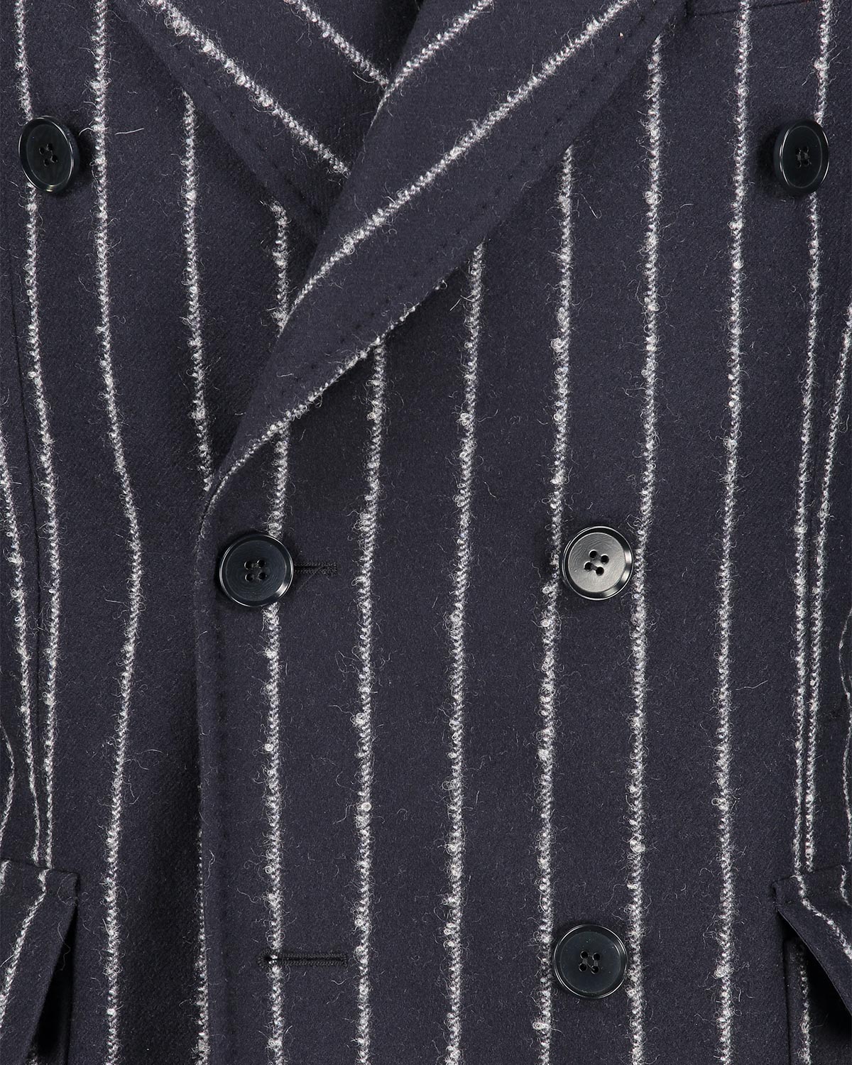 Close-up of a dark blue pinstripe coat with black buttons