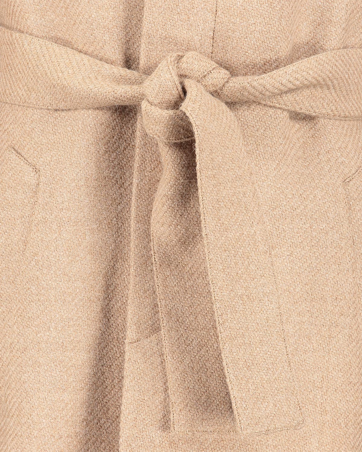 Close-up of a beige overcoat wool fabric