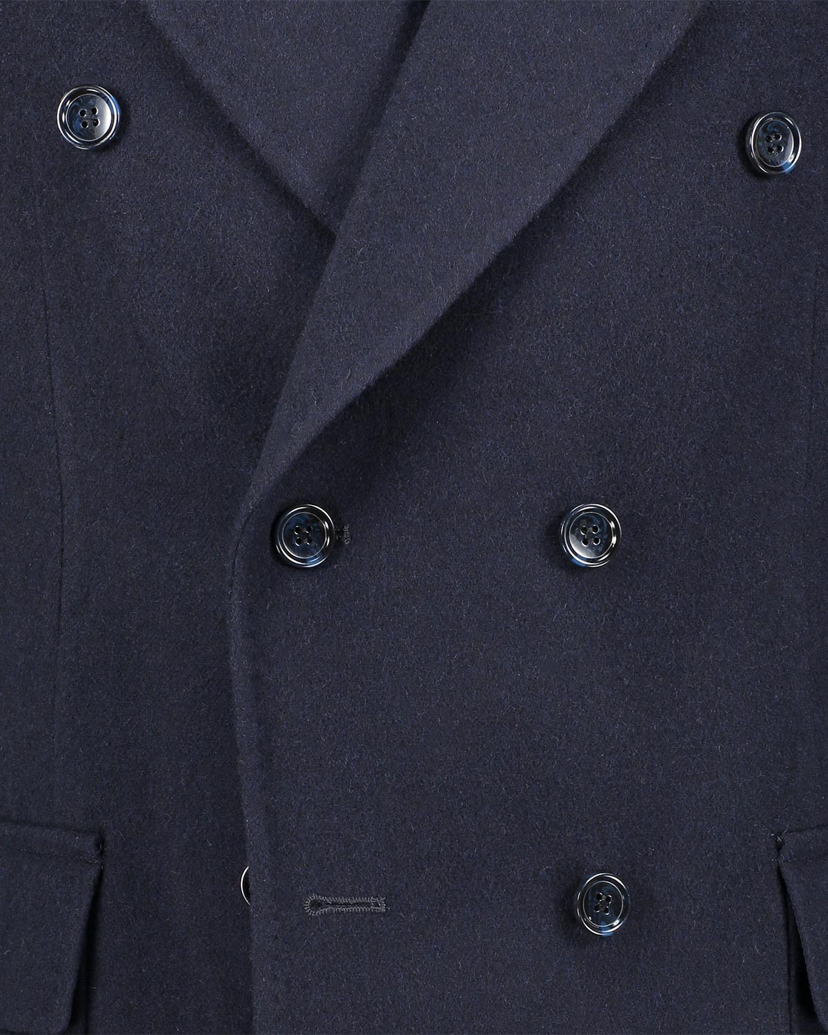 Close-up of a navy blue double breasted coat with button details