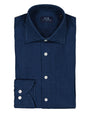 Folded navy blue denim shirt with visible brand logo on a white background