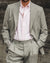 Man Wearing Pink Oxford Shirt Under Light Grey Wool Suit