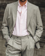 Man Wearing Pink Oxford Shirt Under Light Grey Wool Suit